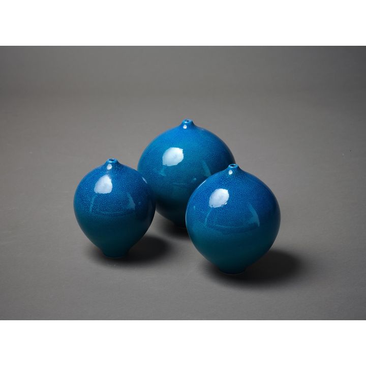 Graham Ambrose - Three turquoise orb vases