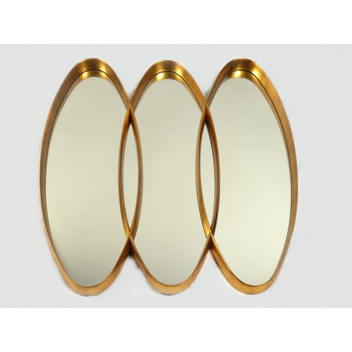 A 1960’s modernist gilt wall mirror