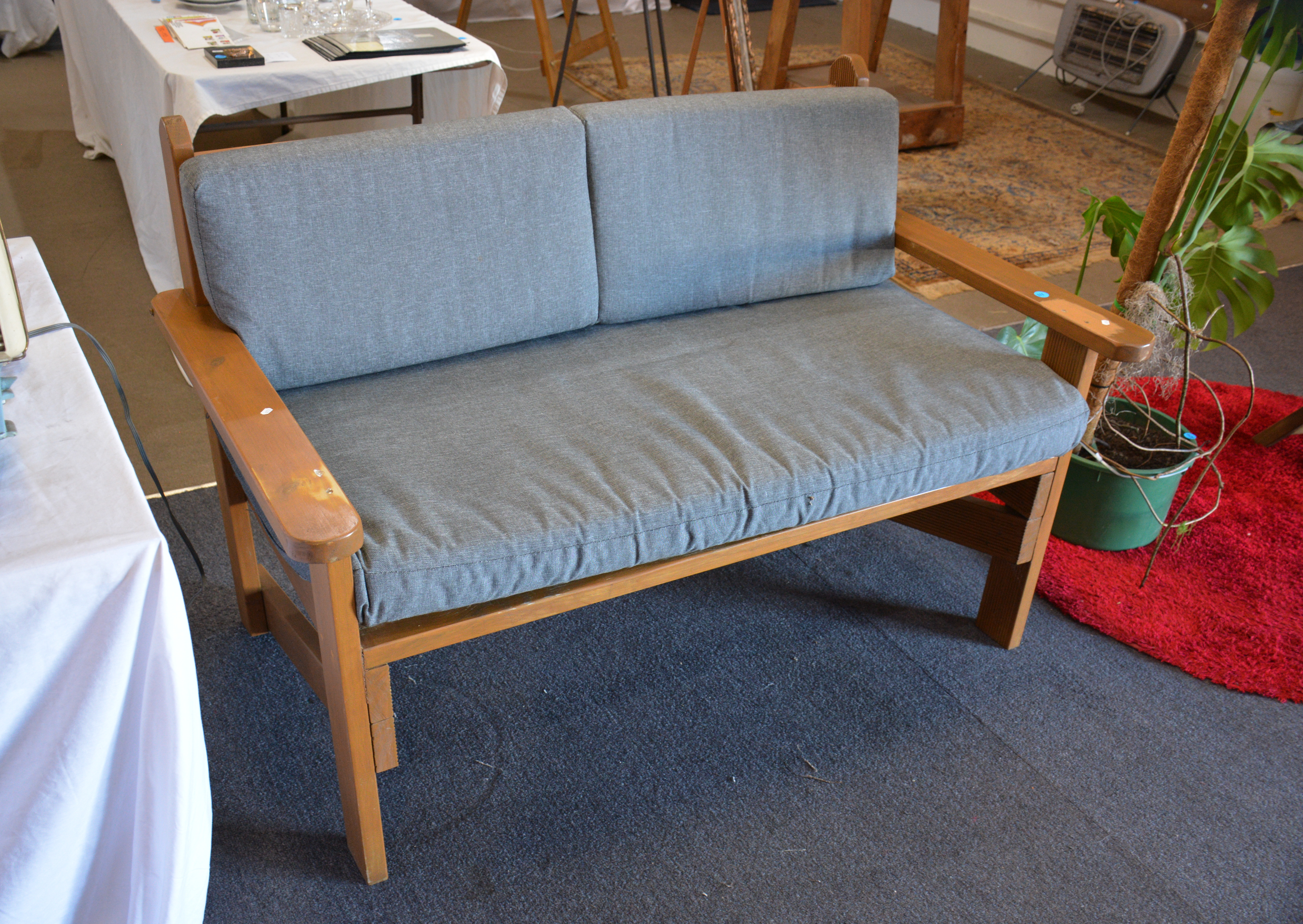 Solid 2.5 Seater Outdoor Bench + Cushions — sold at auction in New Zealand for $250