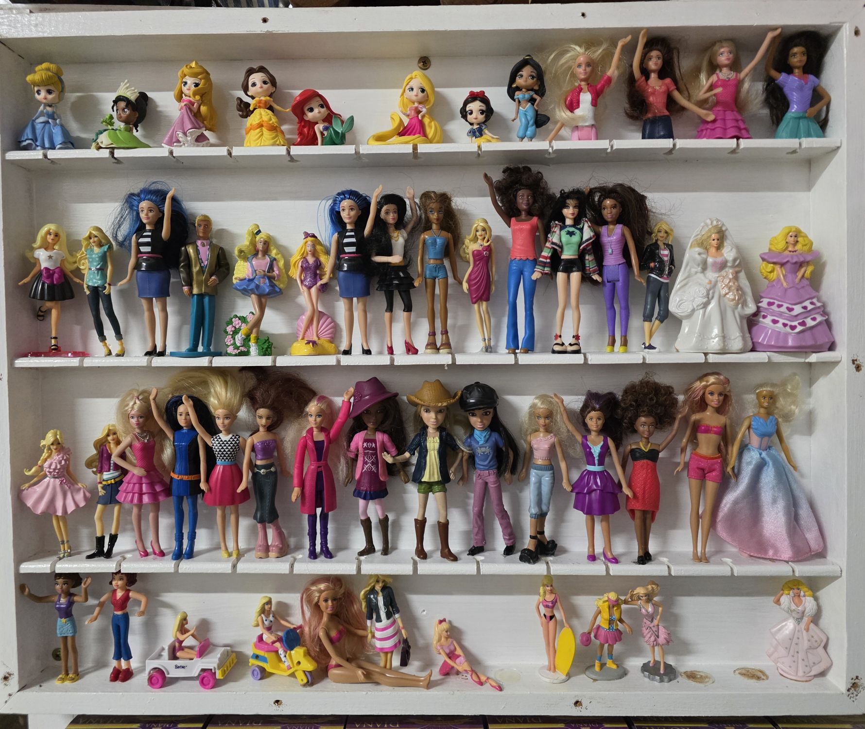 1106 · ASSORTED DOLLS AND BARBIES