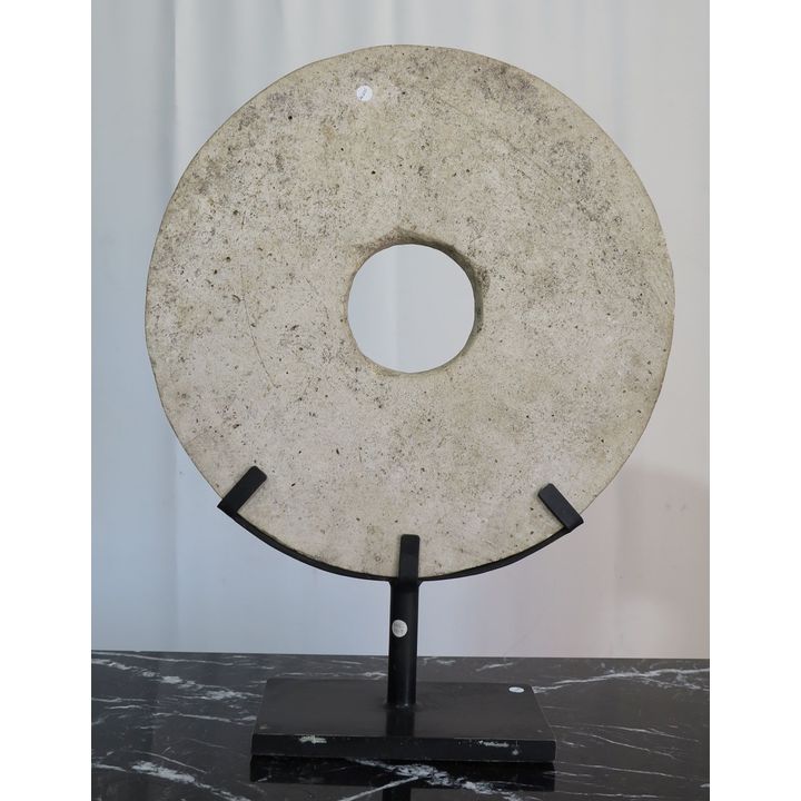 LARGE STONE DISC ON STEEL STAND