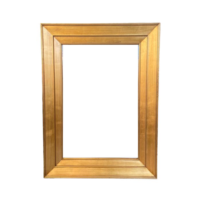 A large modern gilt frame rectangular mirror