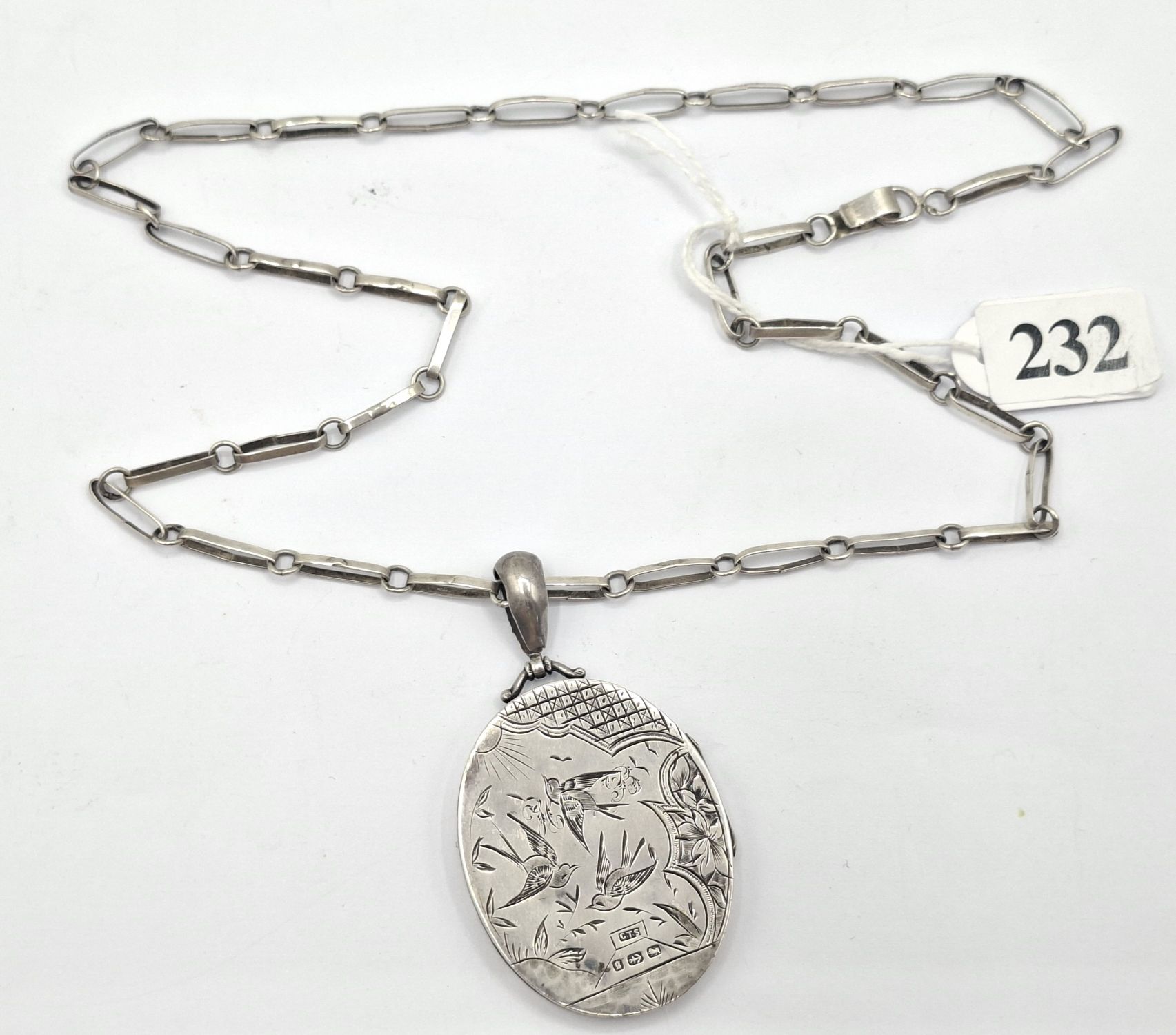 232 · VICTORIAN STERLING SILVER LOCKET ON CHAIN