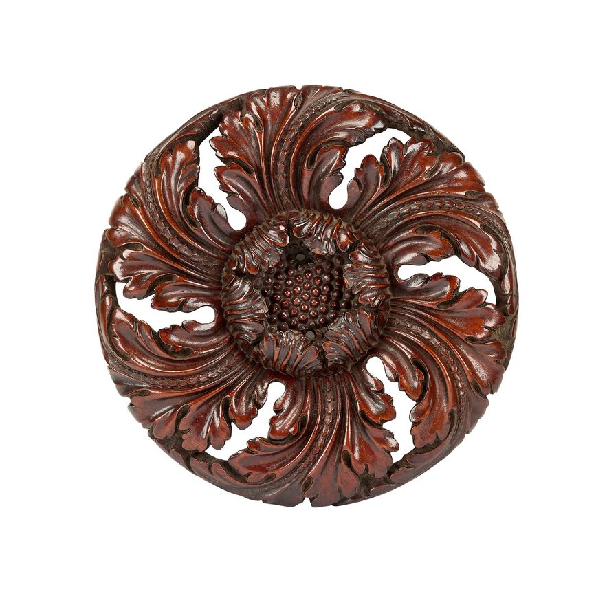 A Regency mahogany carved rosette architectural fragment