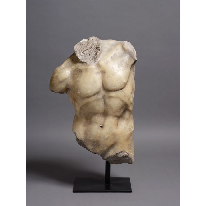 A decorative resin bust torso