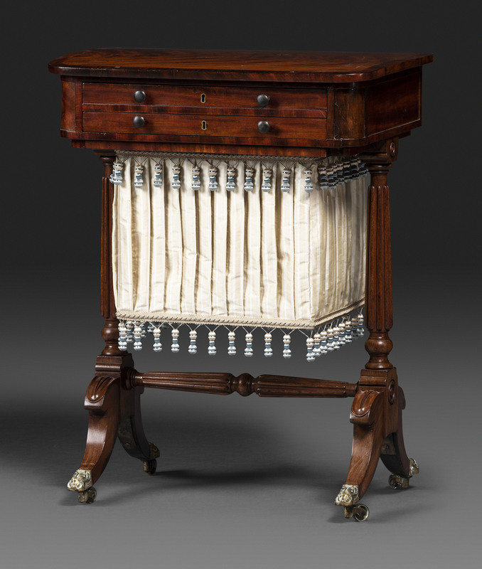 A Classical Figured Mahogany and Rosewood Veneered Sewing Table