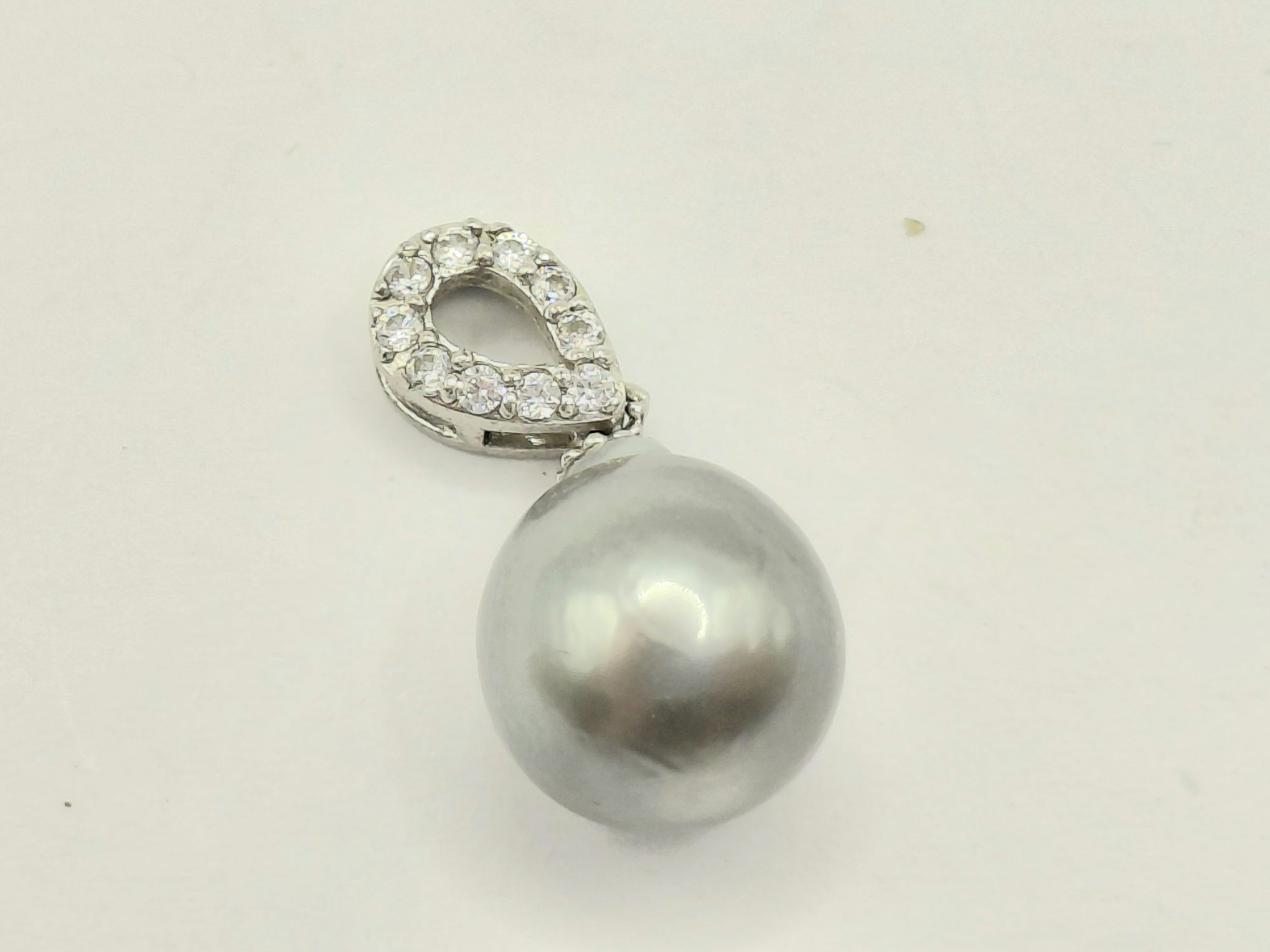 17 · STERLING SILVER PENDANT