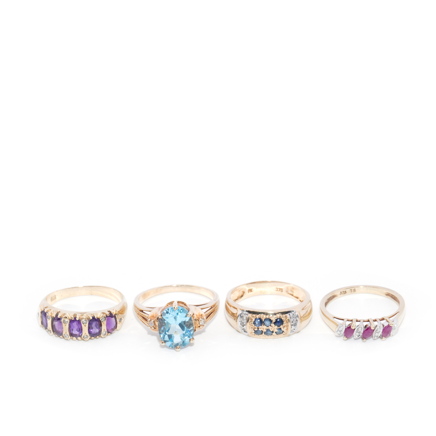 Four 9 Carat Gold Rings