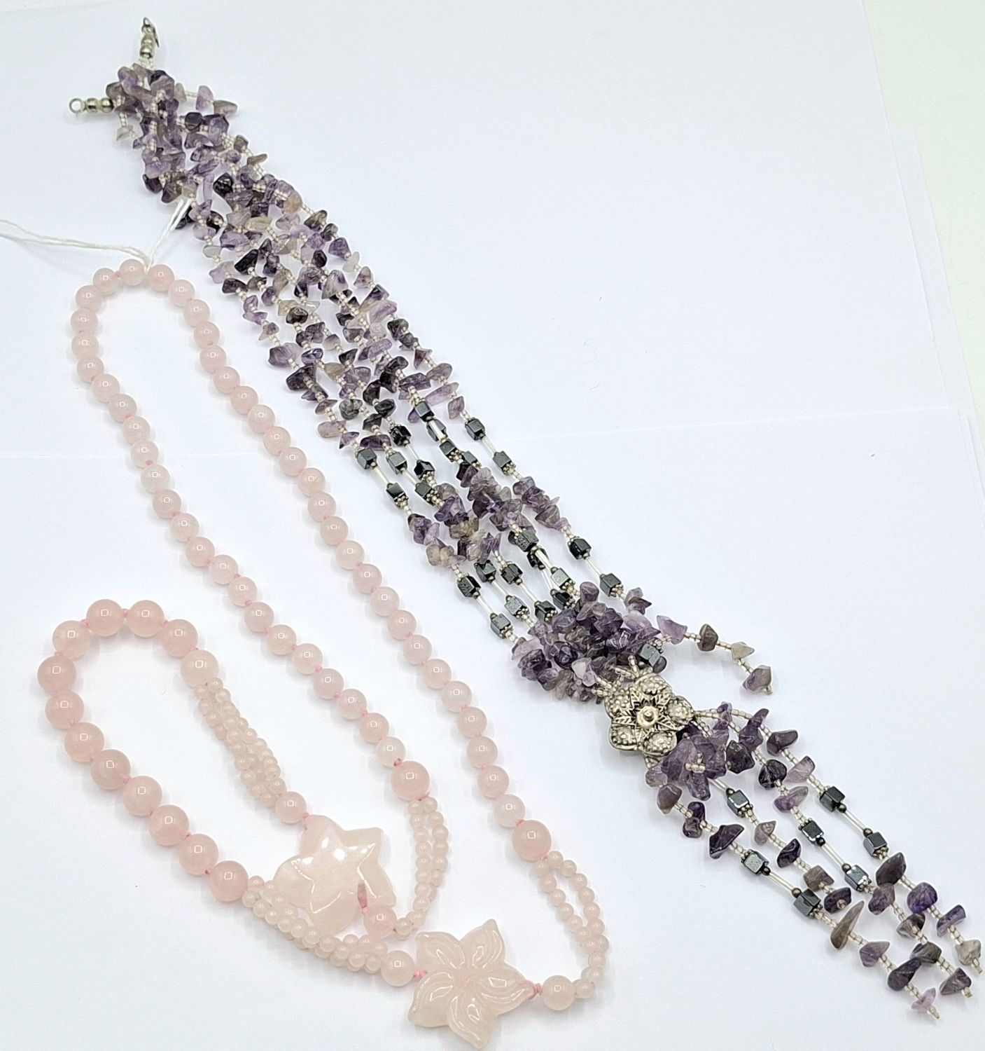1064 · BEADED NECKLACES