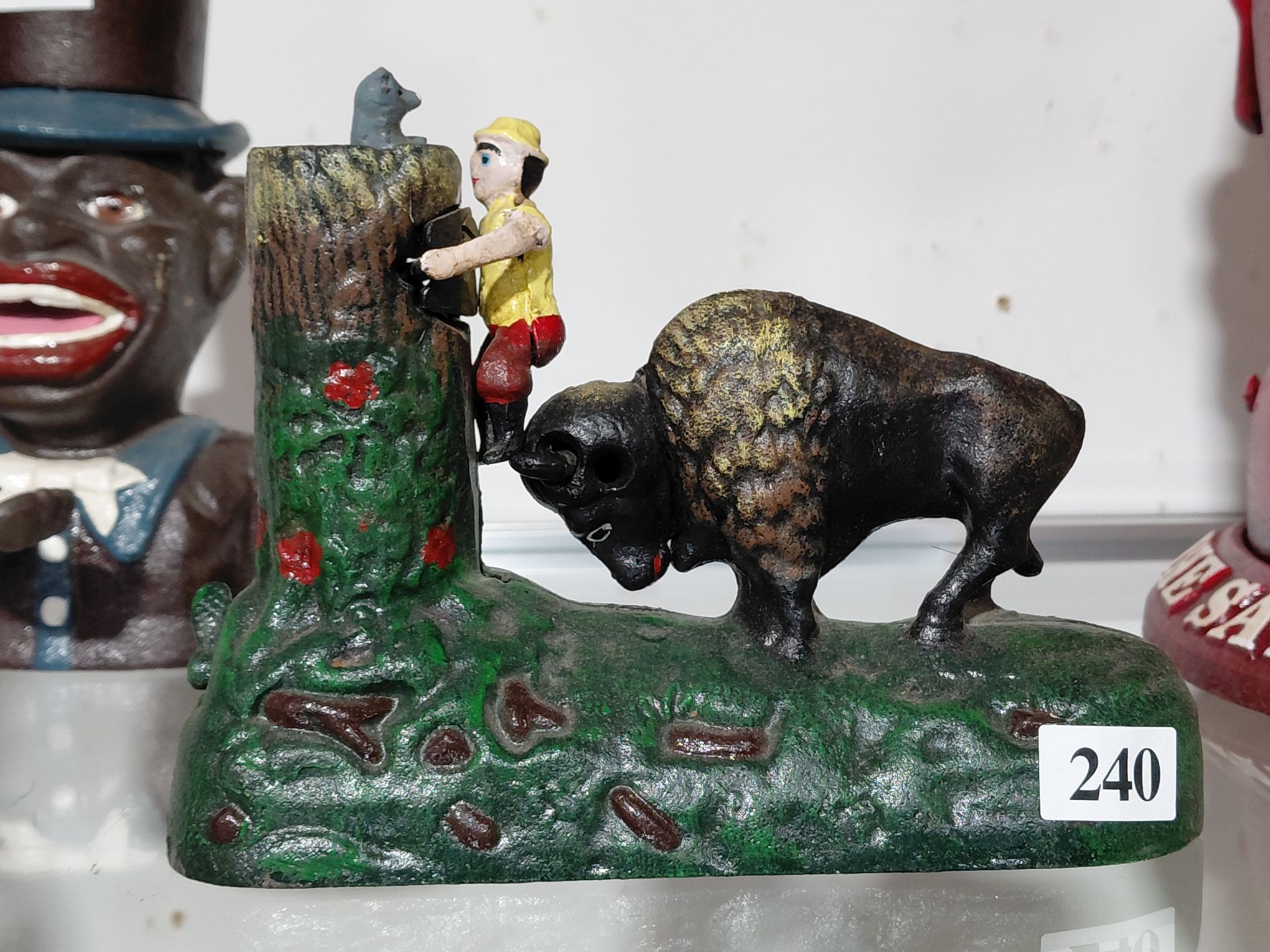 240 · CAST IRON MONEY BOX