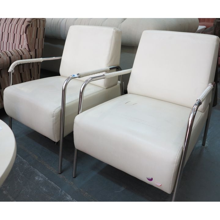 PAIR OF VINYL UPHOLSTERED CHROME ARMCHAIRS,
