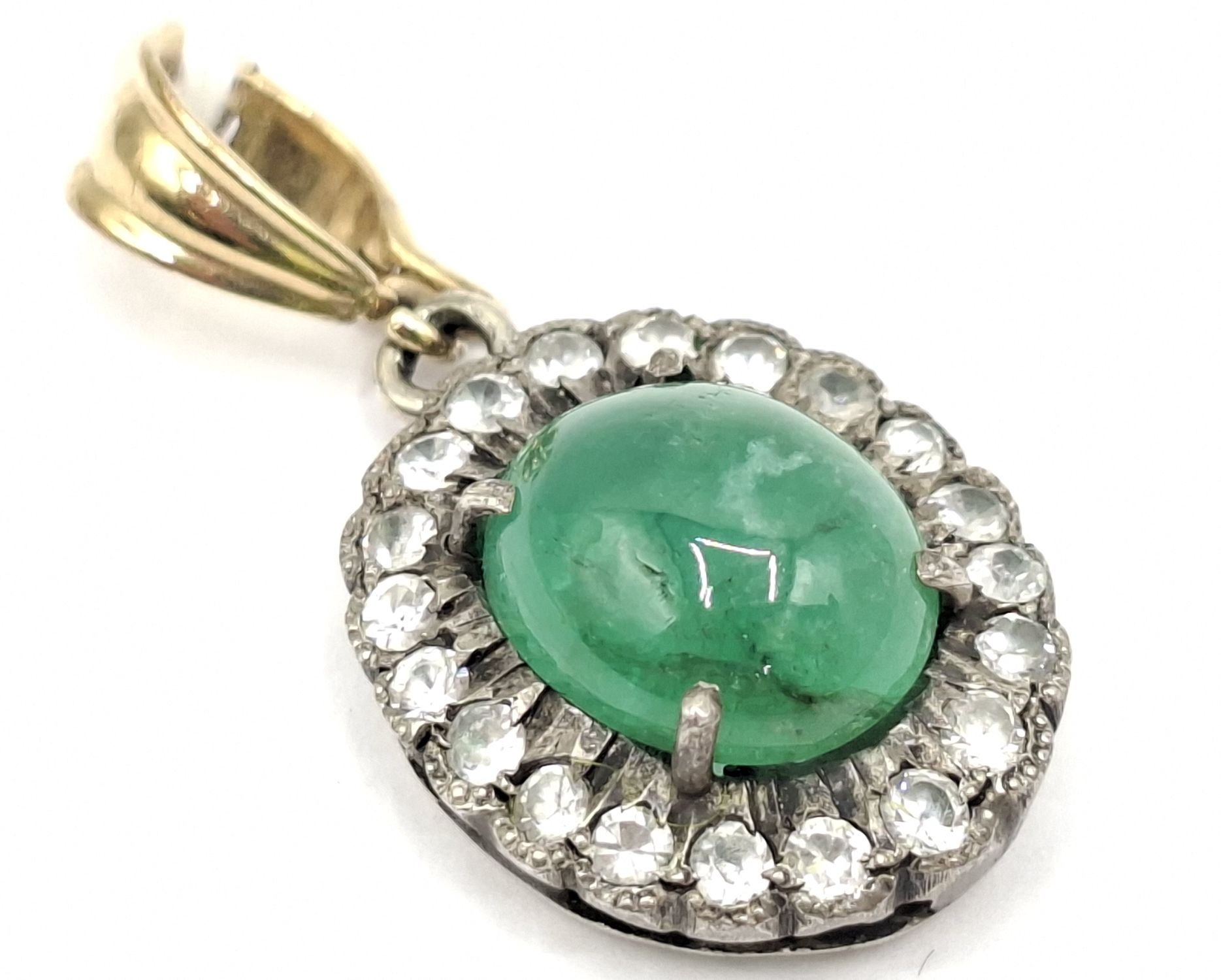 1159 · 9CT GOLD AND SILVER STONE SET PENDANT