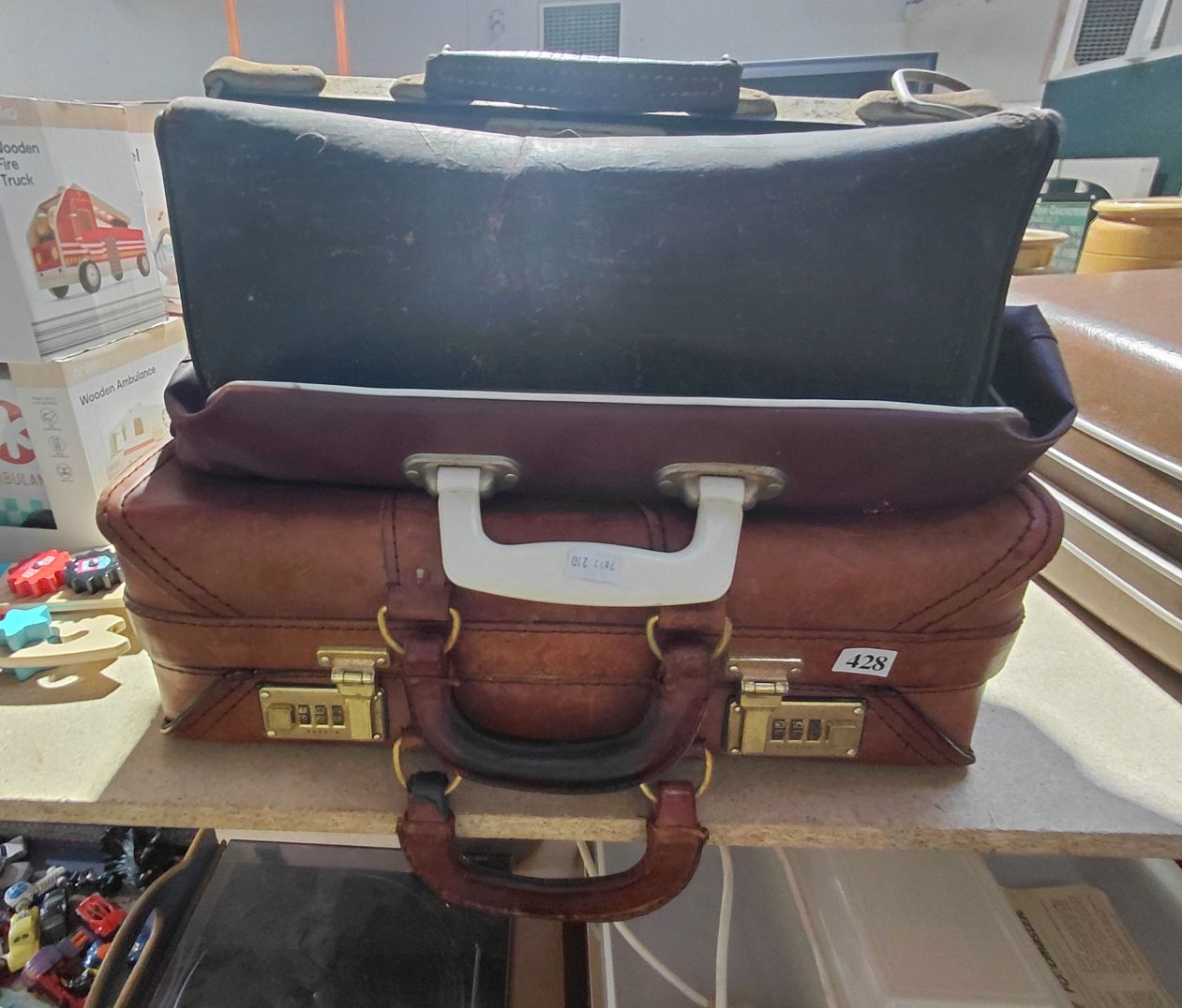 428 · LEATHER ATTACHE CASE AND TRAVEL BAG