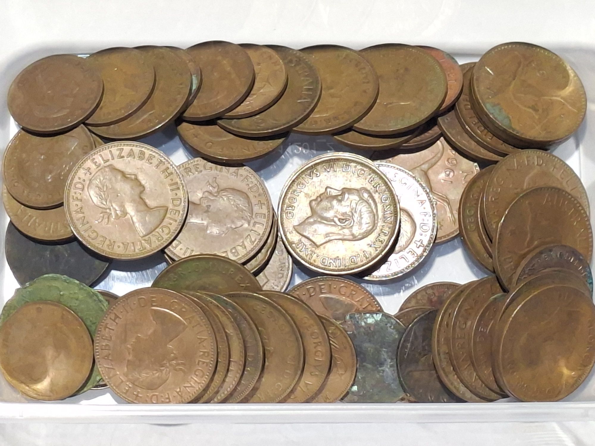 Assorted Pennies And Halves