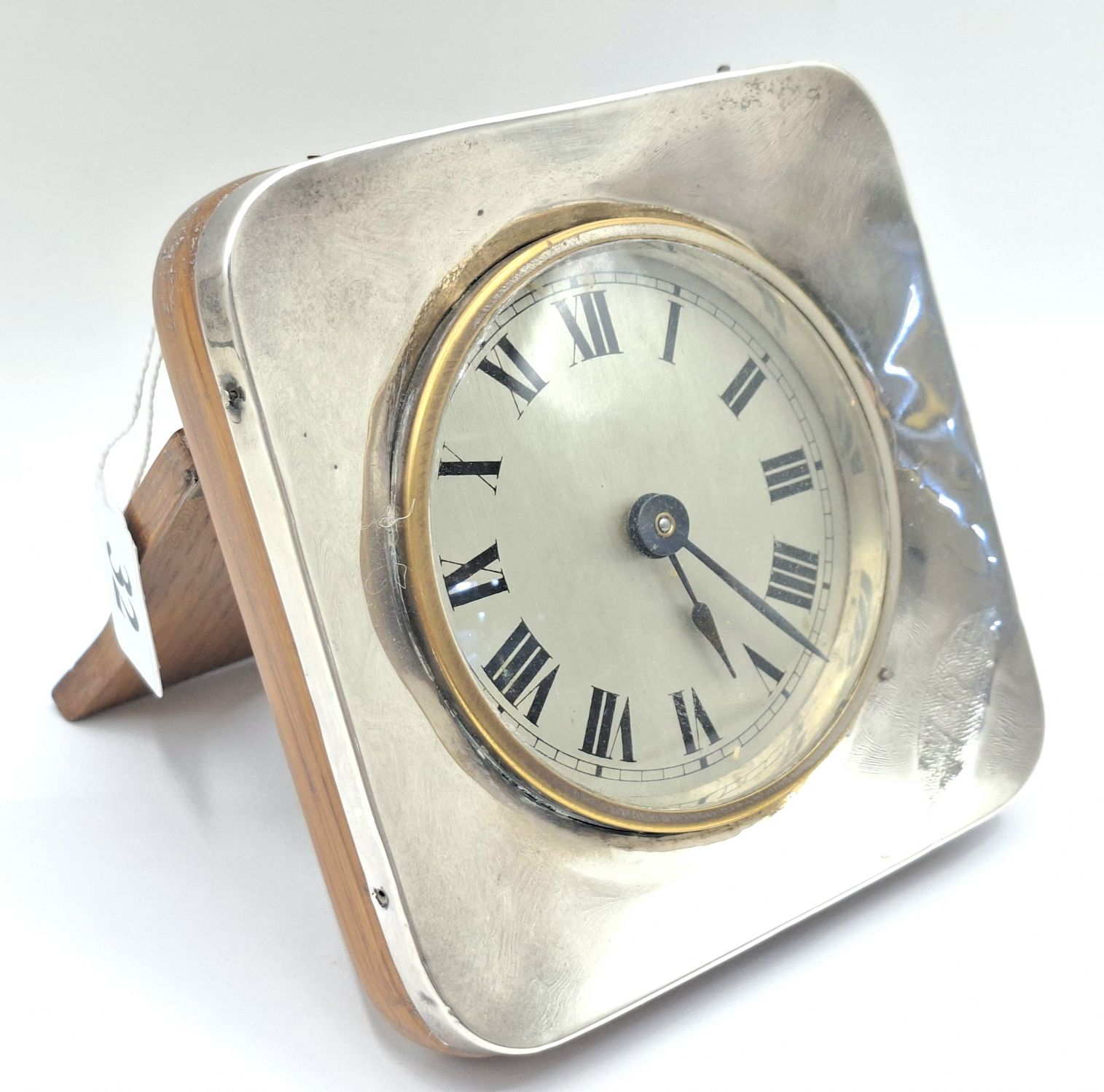 32 · OAK AND SILVER CLOCK