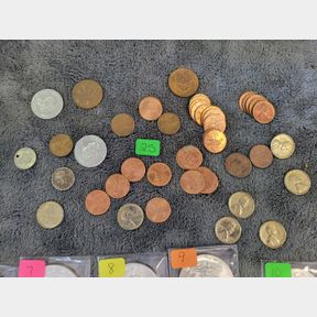 Various Heads or Tails tokens and other collectible coins
