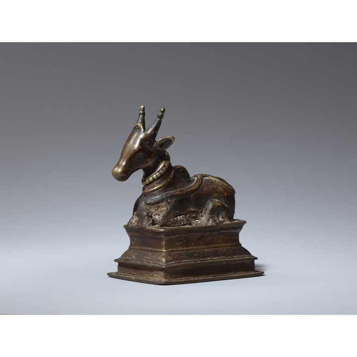 A Maharashtra/Karnataka brass figure of Nandi. 18/19th century
