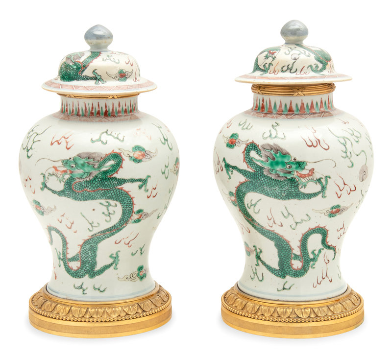 A Pair of Gilt Bronze Mounted Wucai Porcelain Baluster Jars and Covers