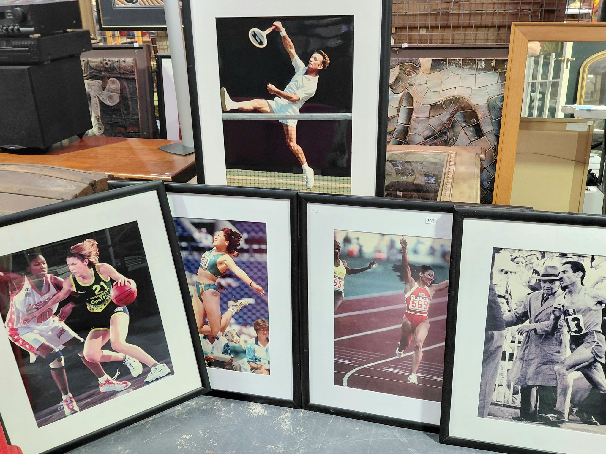 A Group Of 5 Sporting Photographs