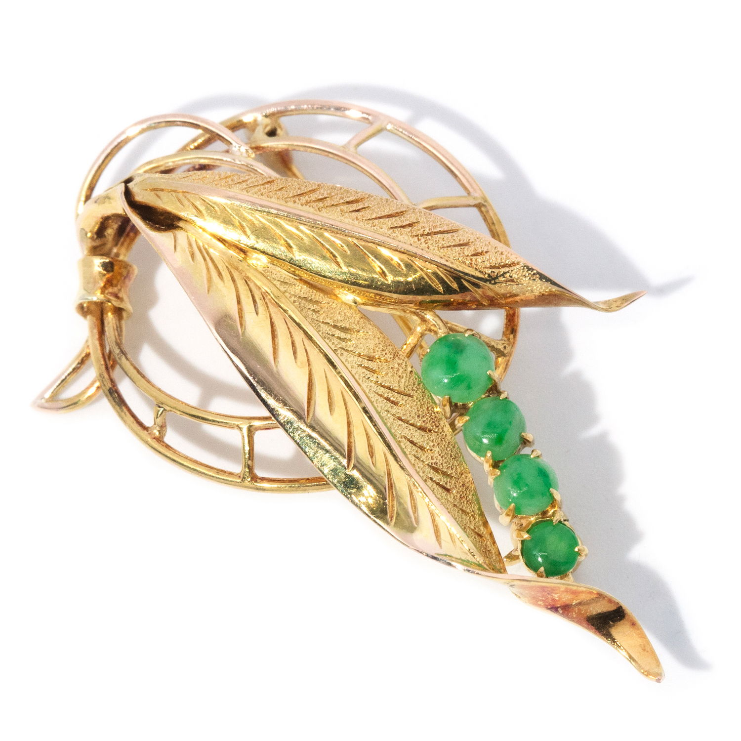 91 · Feather Brooch with Jade in 14ct Gold