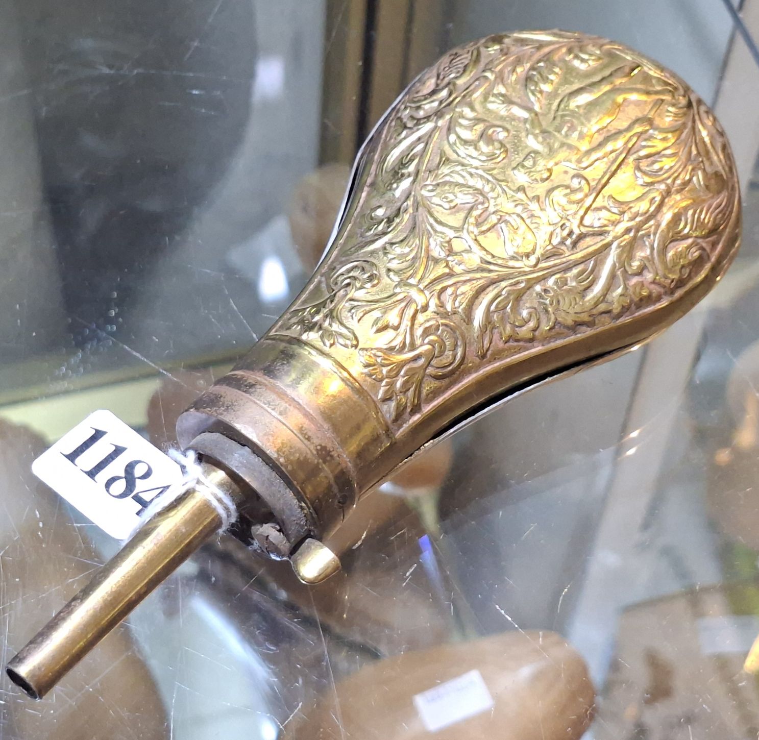 1184 · VINTAGE EMBOSSED POWDER FLASK