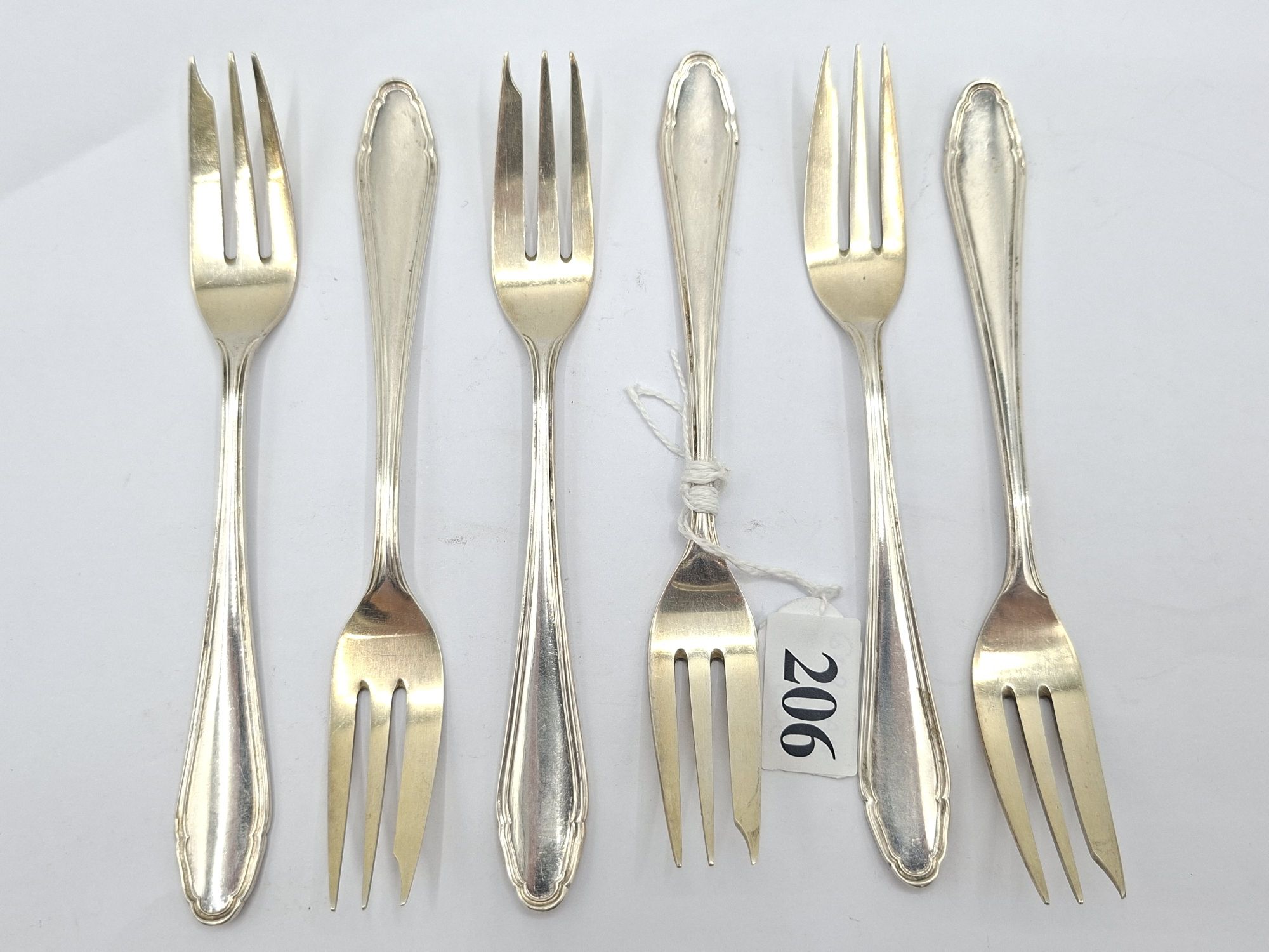 206 · SUITE OF 800 GERMAN SILVER CAKE FORKS
