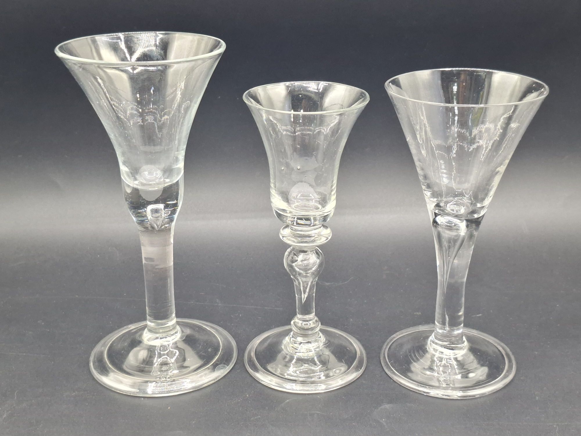 64 · THREE 18TH CENTURY ALE GLASSES