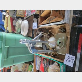 Antique electric curling iron, press stand and other old metal items