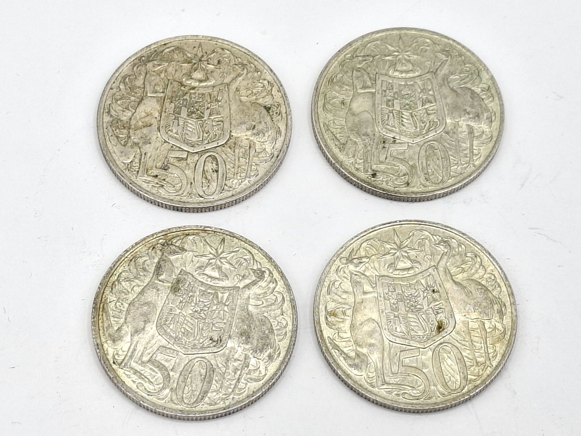 1026 · FOUR 50C COINS