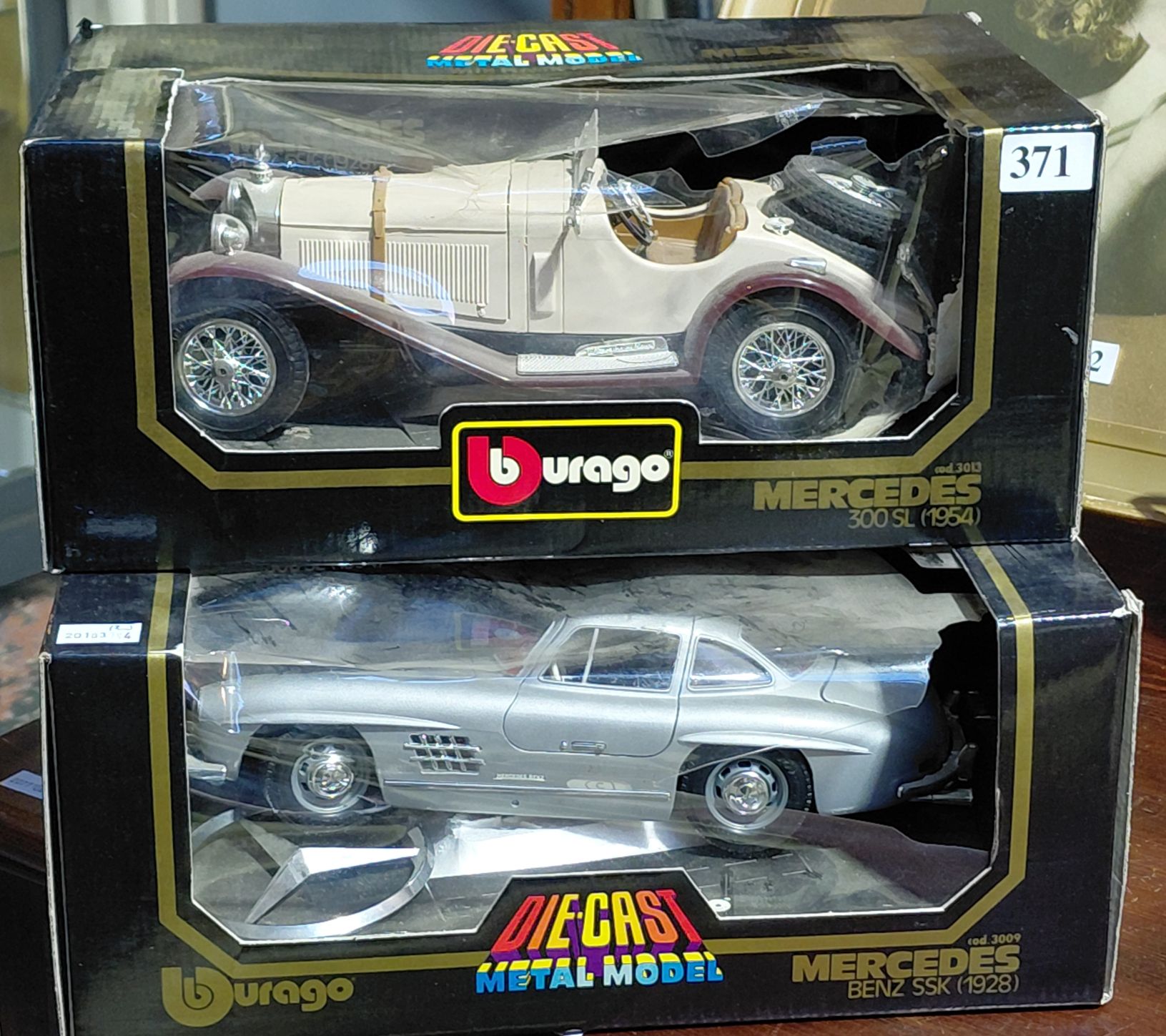 TWO BURAGO DIE CAST CARS