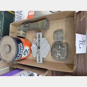 Heston buckles, military flashlight and tobacco can