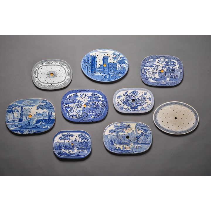 Collection of nine English 19th Century draining plates
