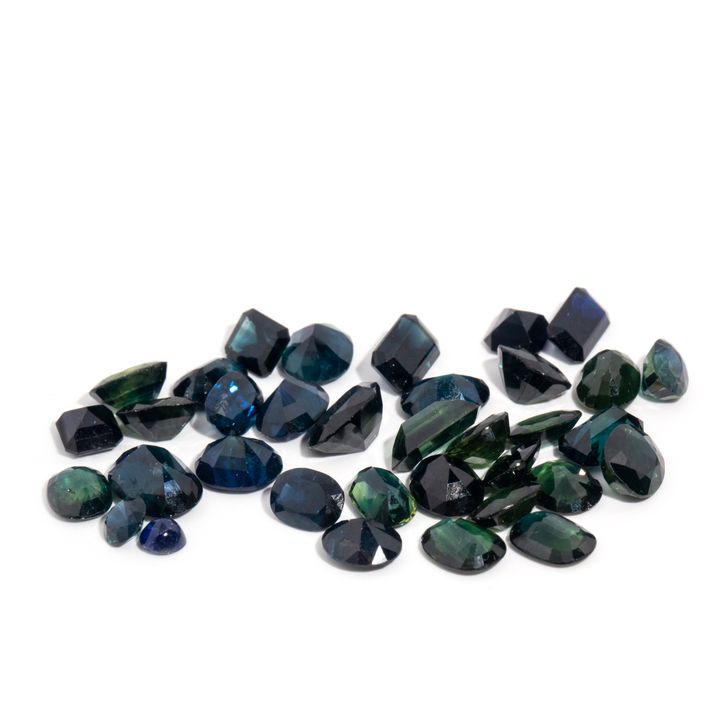 55.76 Carats of Green and Teal Sapphires