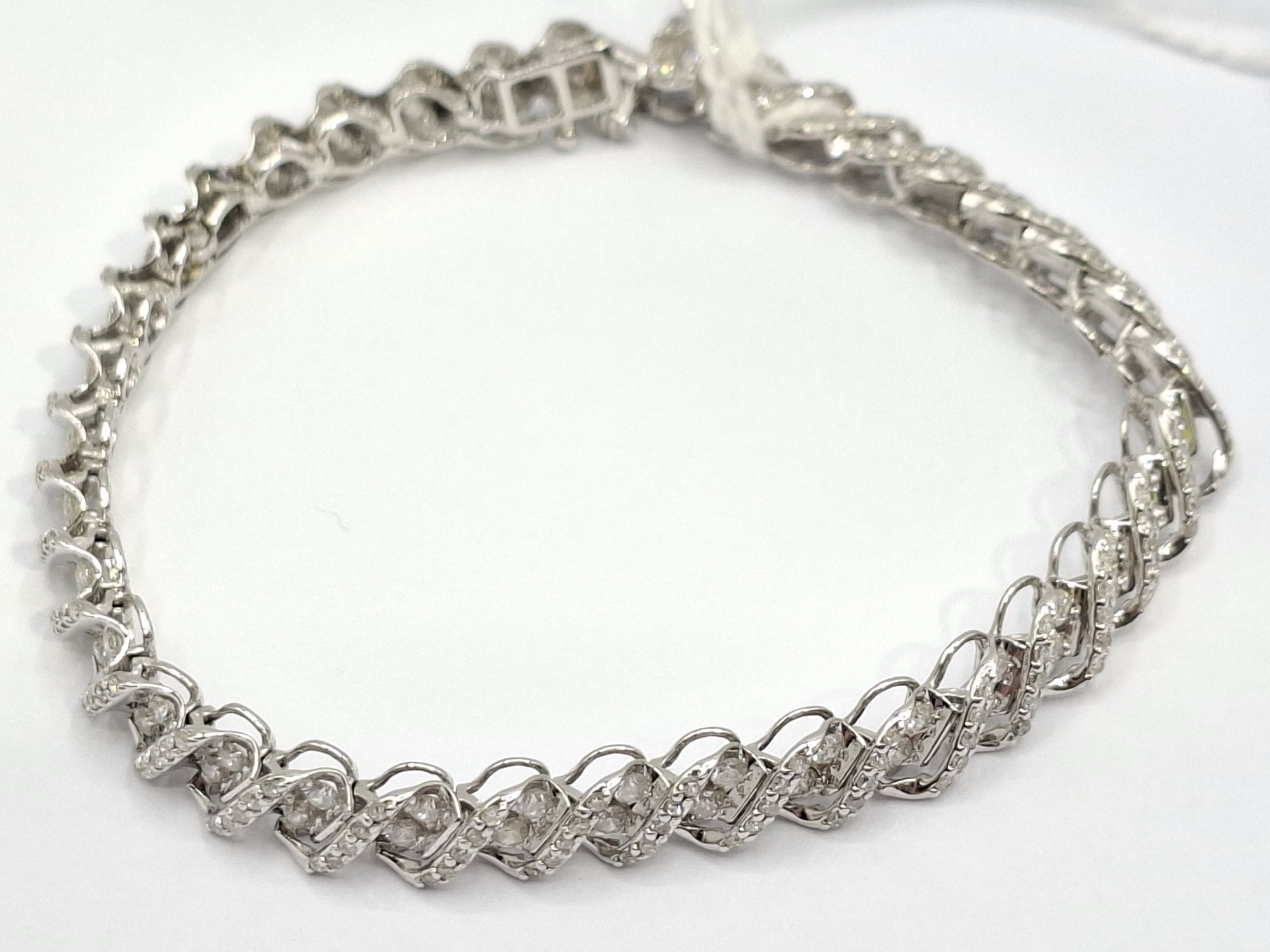 244 · 14CT GOLD DIAMOND BRACELET