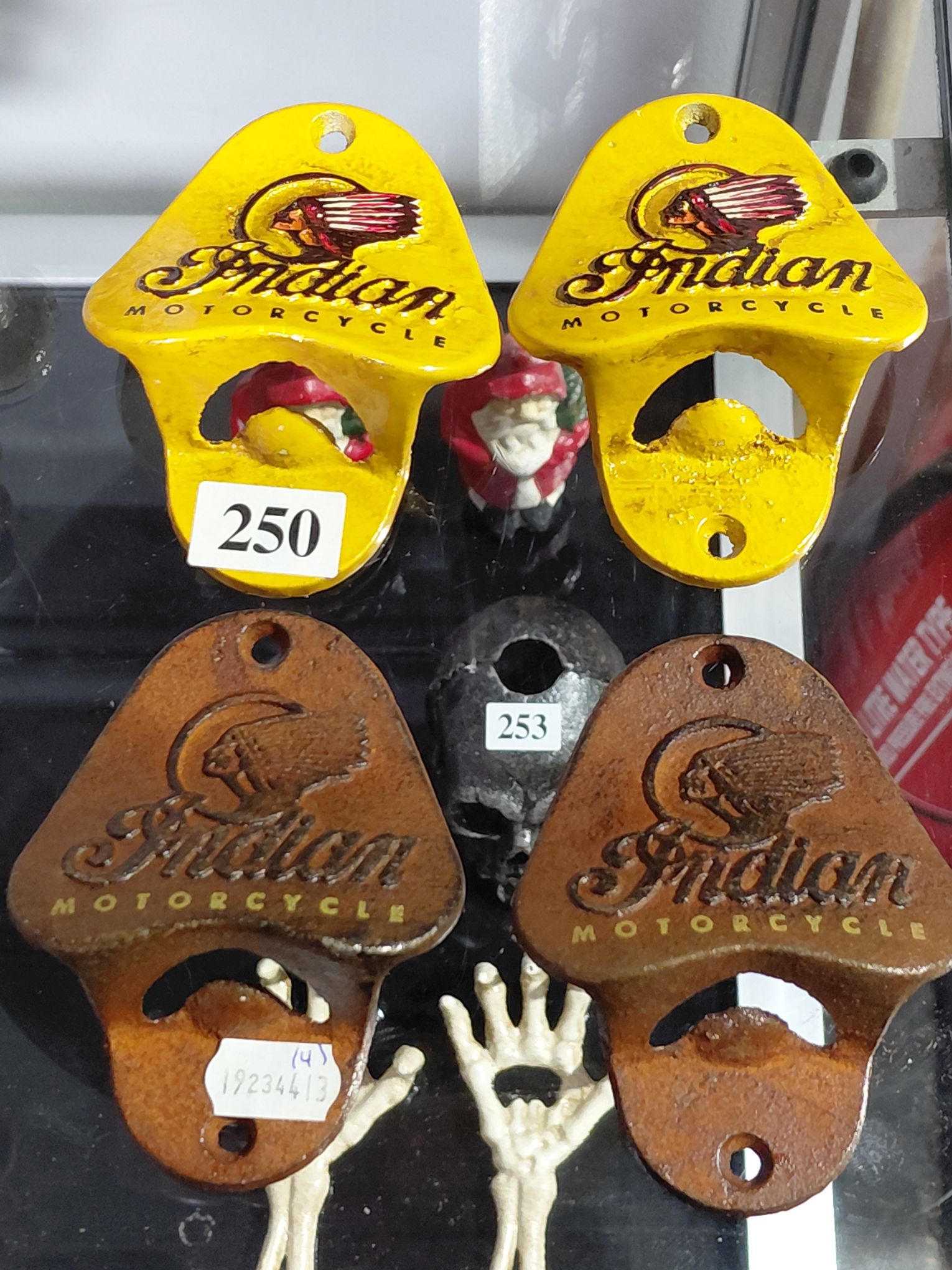 250 · 4 CAST IRON BOTTLE OPENERS