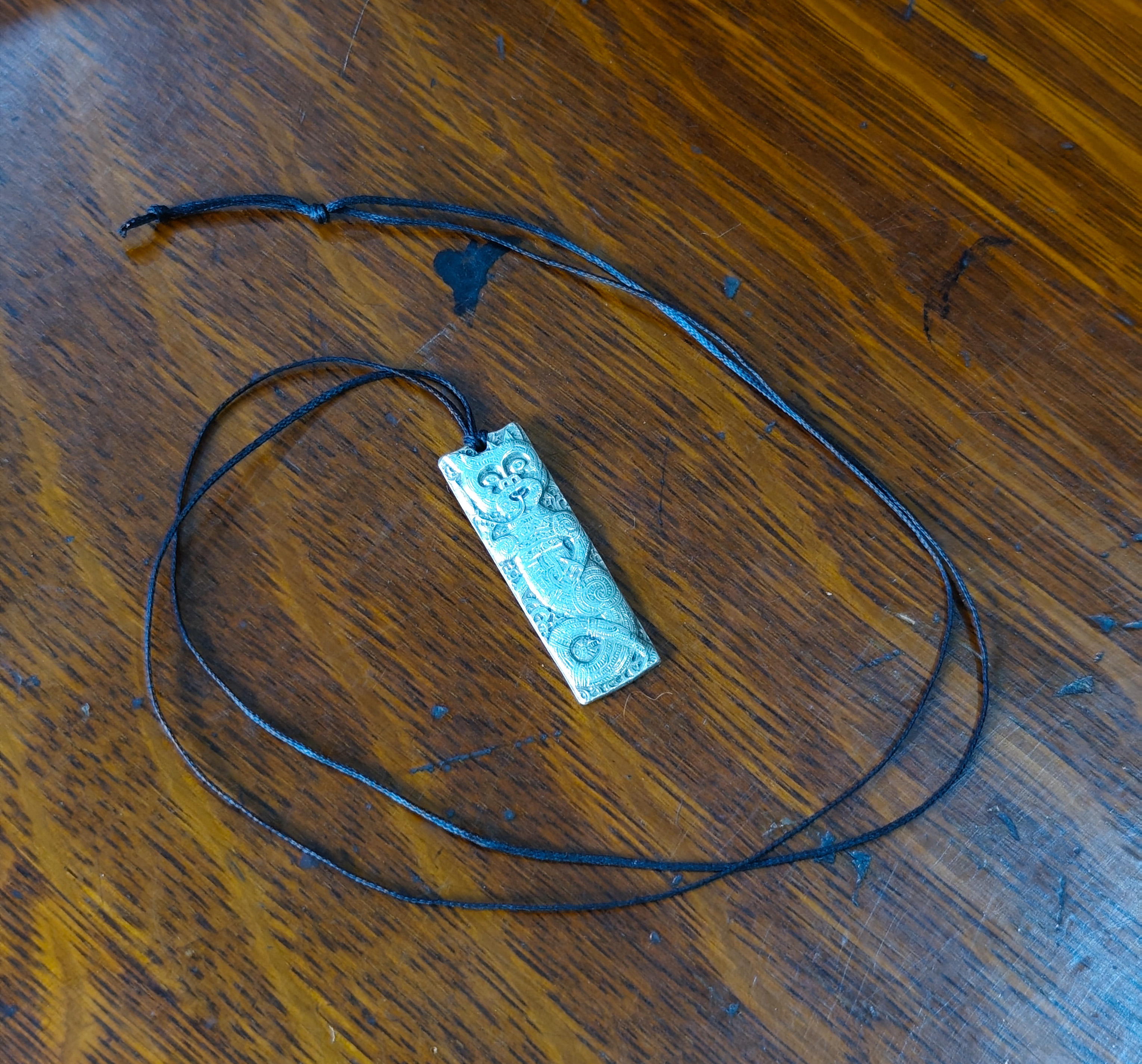 Vintage/Antique Metal Maori Tiki Pendant Necklace — sold at auction in New Zealand for $30