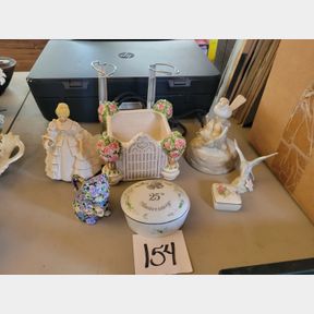 Assorted porcelain figurines and other decorative items