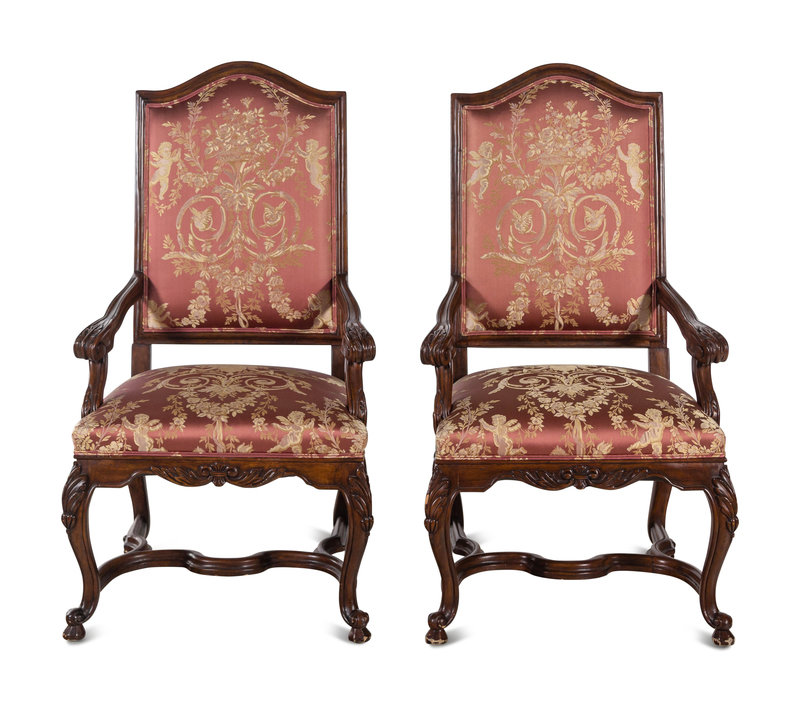 A Pair of Régence Style Walnut Fauteuils