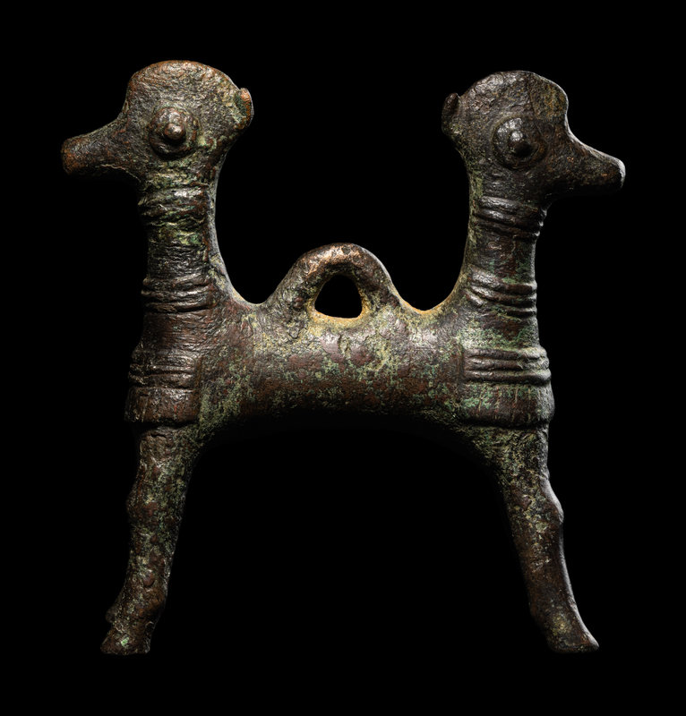 A Luristan Bronze Two-Headed Horse
Height 3 1/4 inches (8.26 cm).