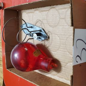 Red Comet glass fire extinguisher with mounting bracket