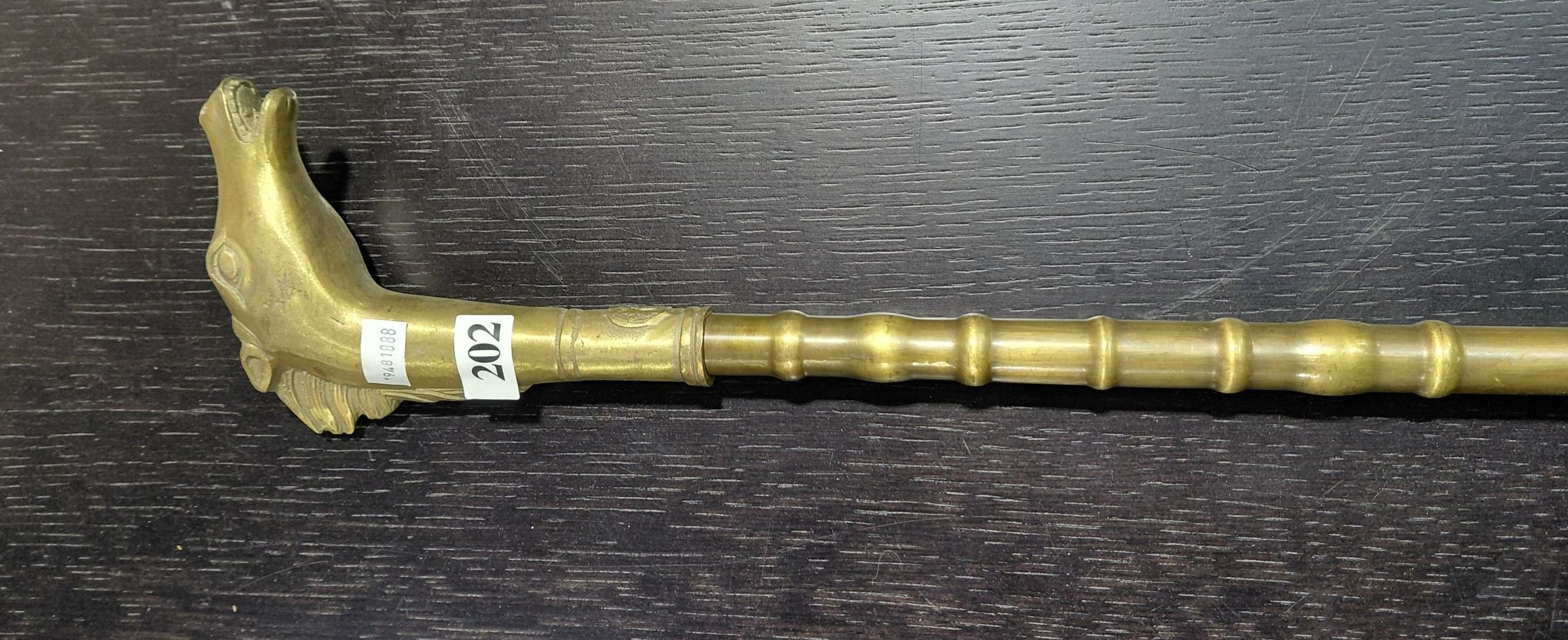 202 · BRASS WALKING STICK