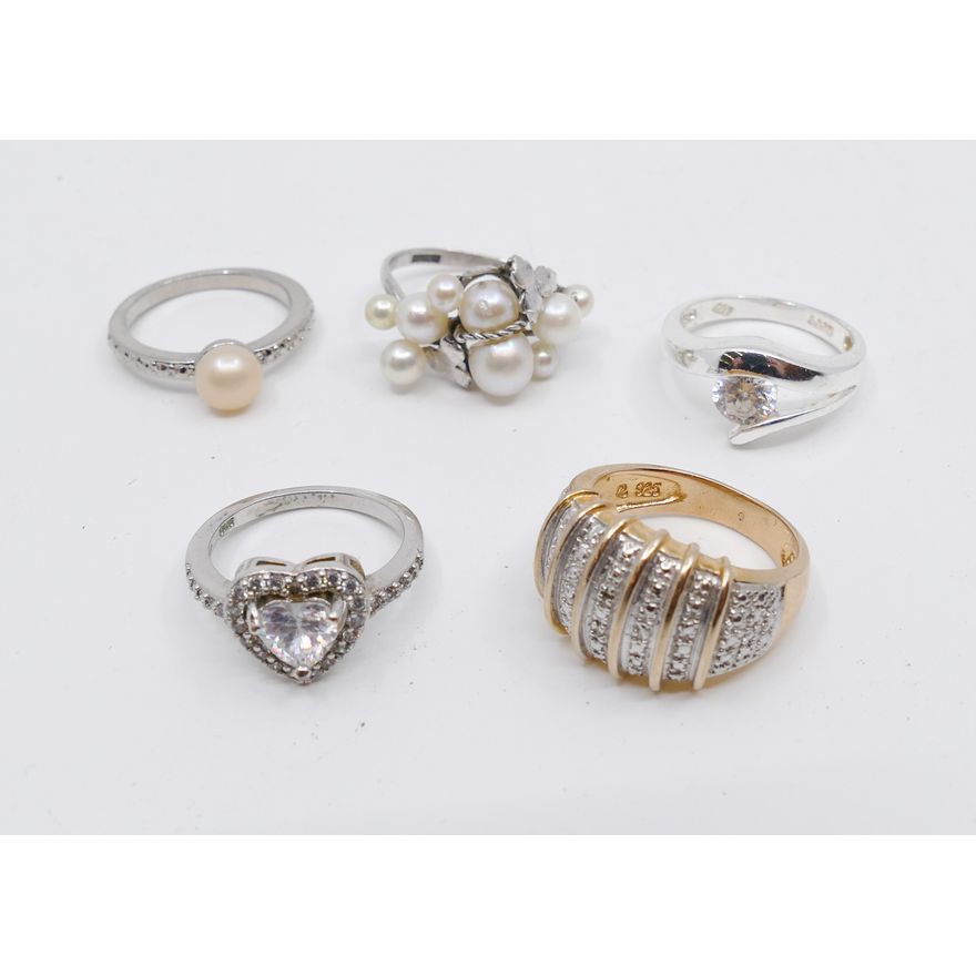 5pc Sterling Rings. Includes CZ and faux pearl. Sizes 5.5-8. 16.32g TW