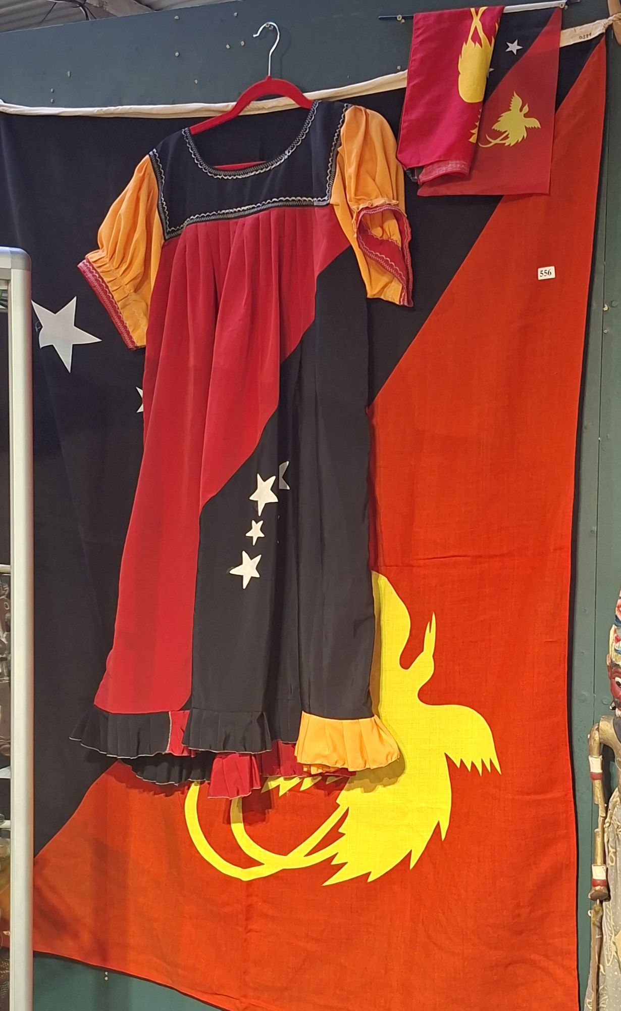 556 · P.N.G. FLAGS AND DRESS