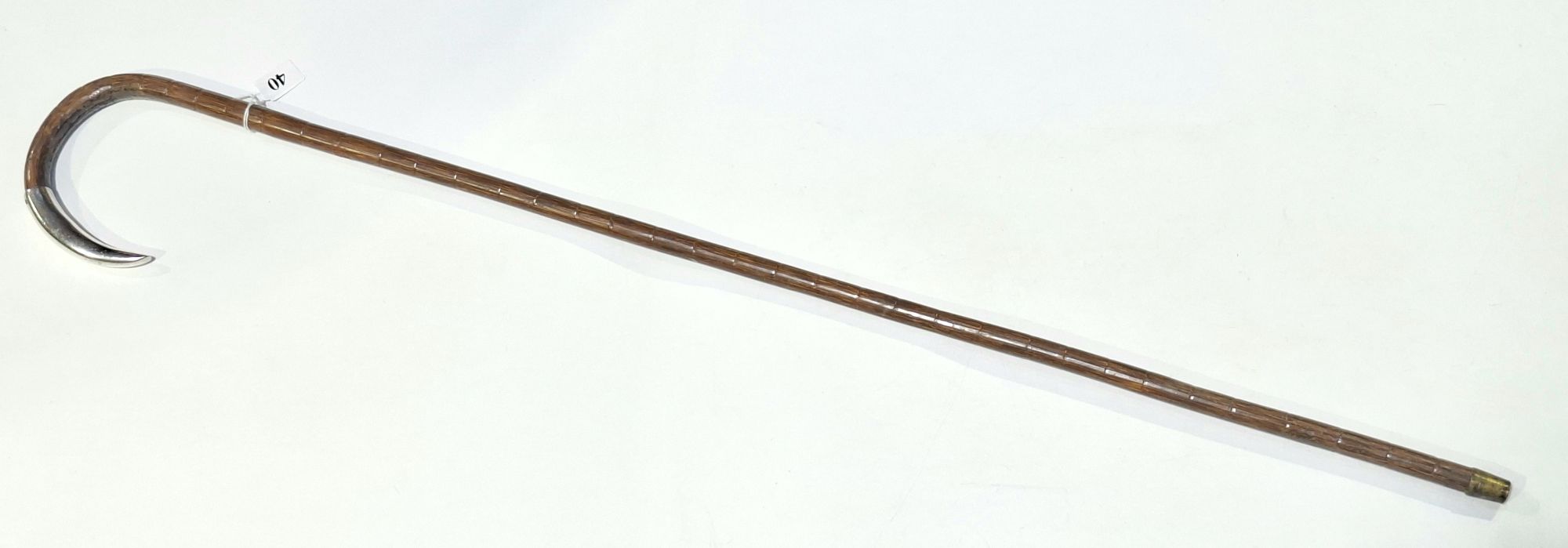 40 · ANTIQUE STERLING SILVER TIPPED CANE
