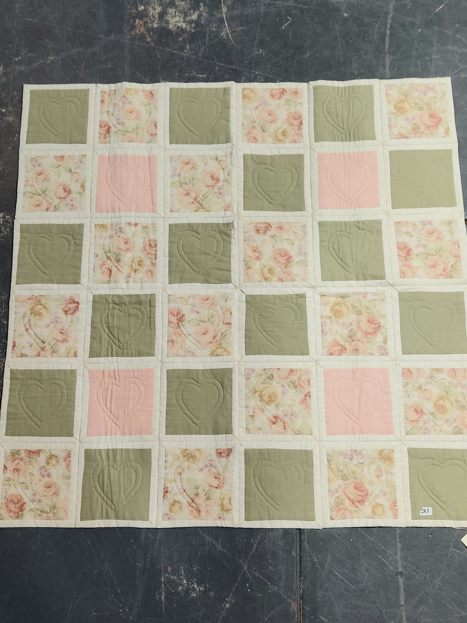 283 · HAND MADE QUILT,