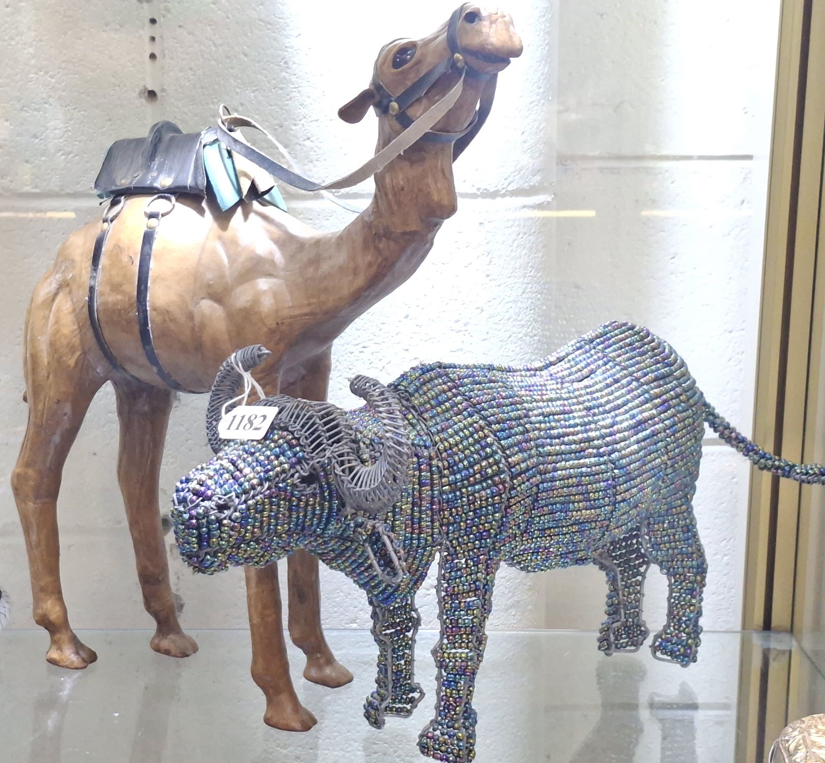 1182 · CAMEL AND BUFFALO ORNAMENTS