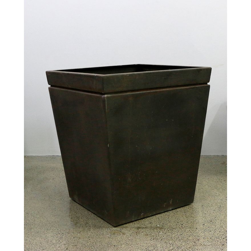 A very large metal planter