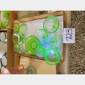 Assorted uranium glass dessert servers and plates