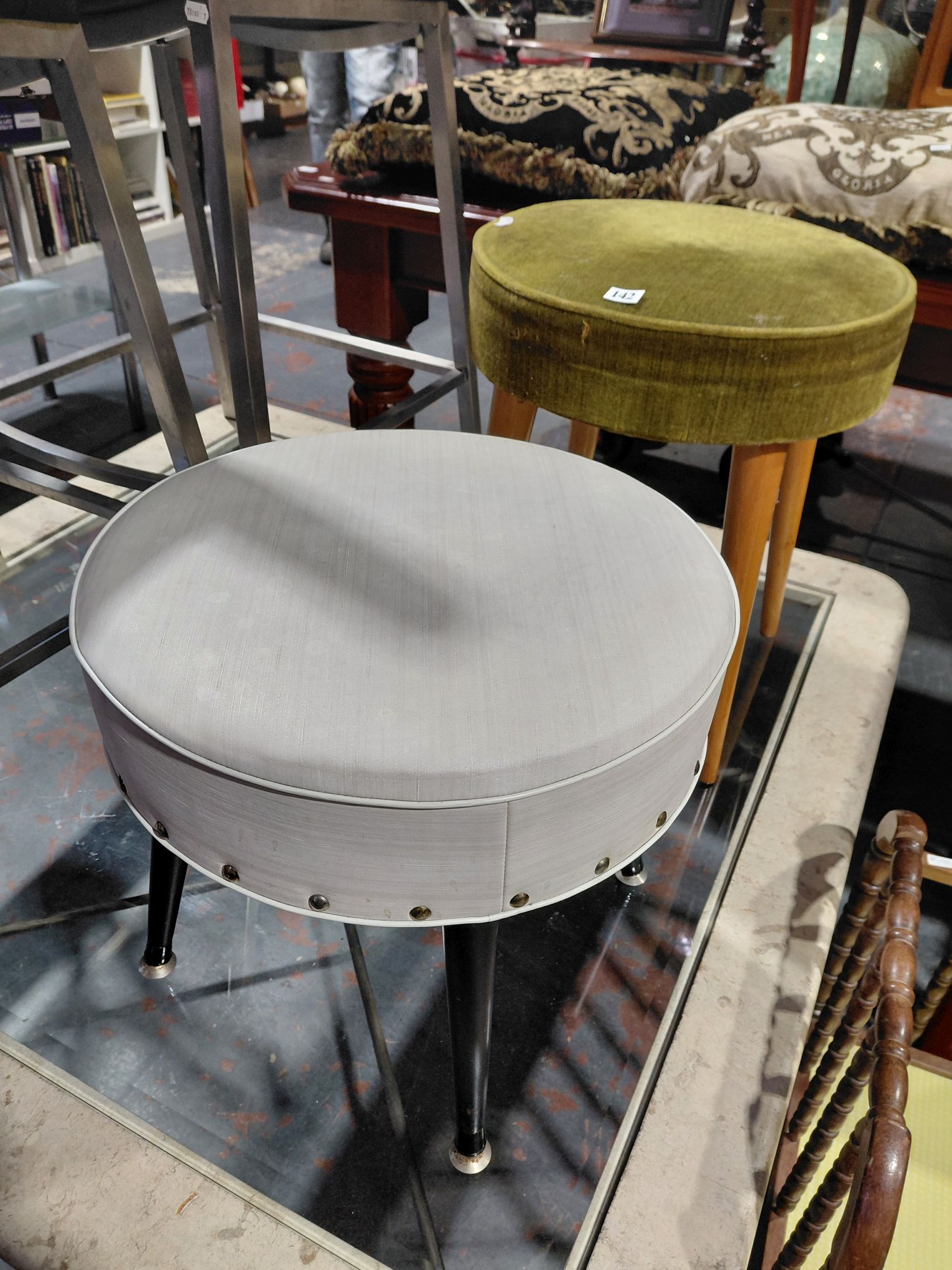142 · TWO VINTAGE FOOT STOOLS