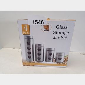 DECADENT 4 PIECE GLASS CANISTER SET WITH STEEL FINISH AND LONG BAR WINDOWS